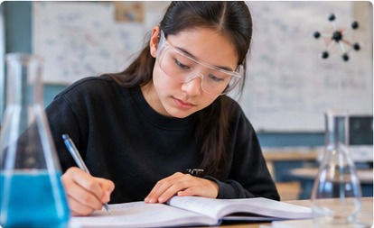 High school student studying chemistry